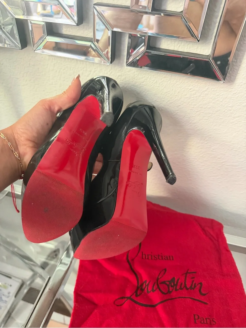 Christian Louboutin Black Patent Mary Jane Pumps with Signature Red Soles